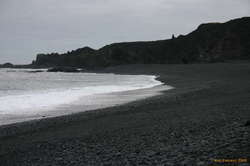 Wide empty rocky beach at Dritvík
