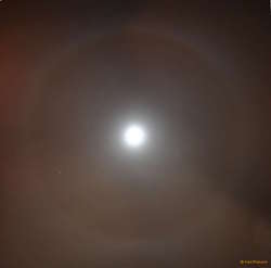 Mars inside a halo around the moon
