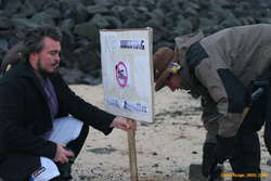Oli and Karl replanting the sign
