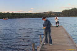 Steph and Oli fishing at dusk